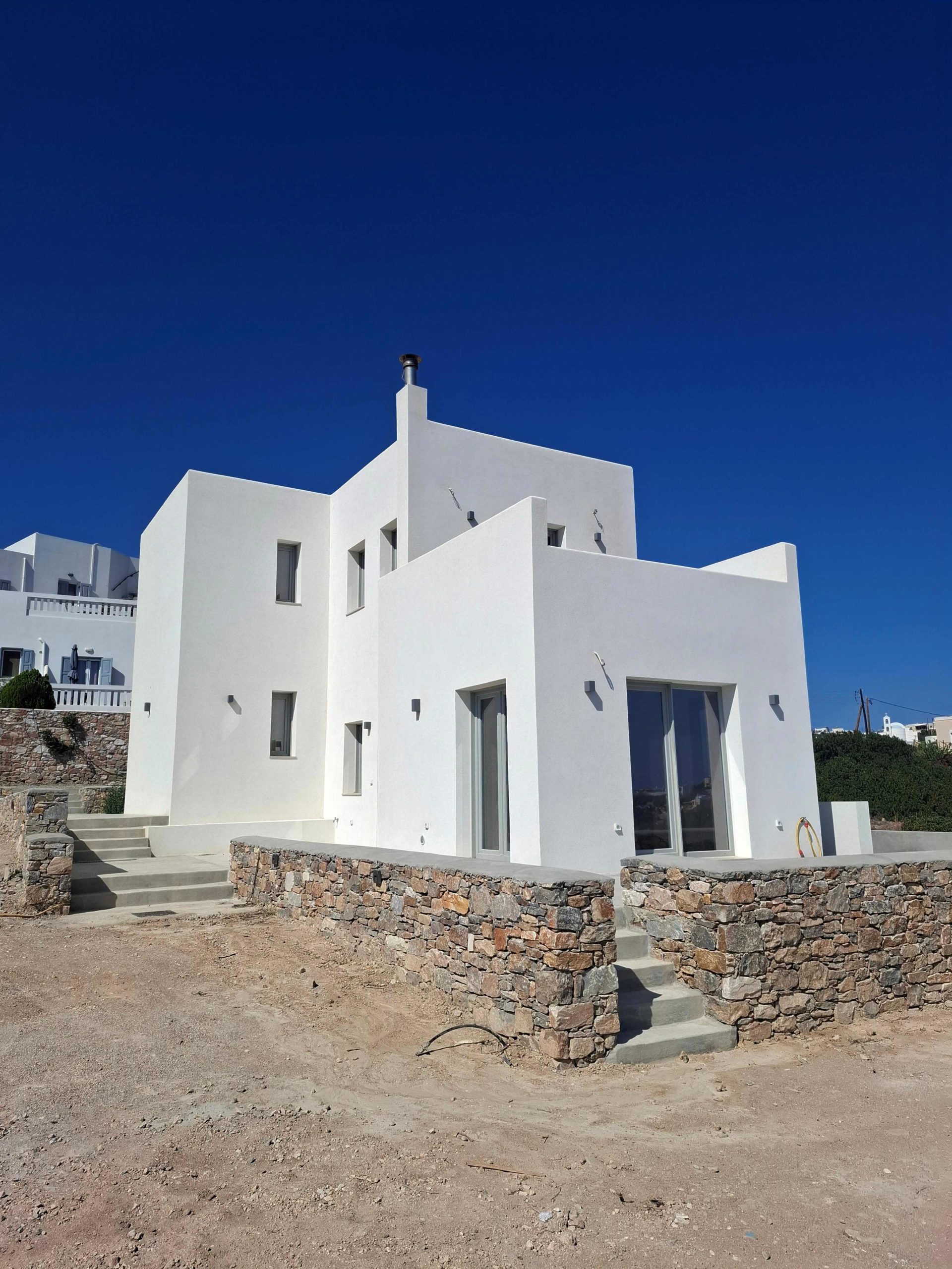 Κατασκευή διώροφης κατοικίας με διαμόρφωση περιβάλλοντα χώρου στην Αζόλιμνο Σύρου gallery