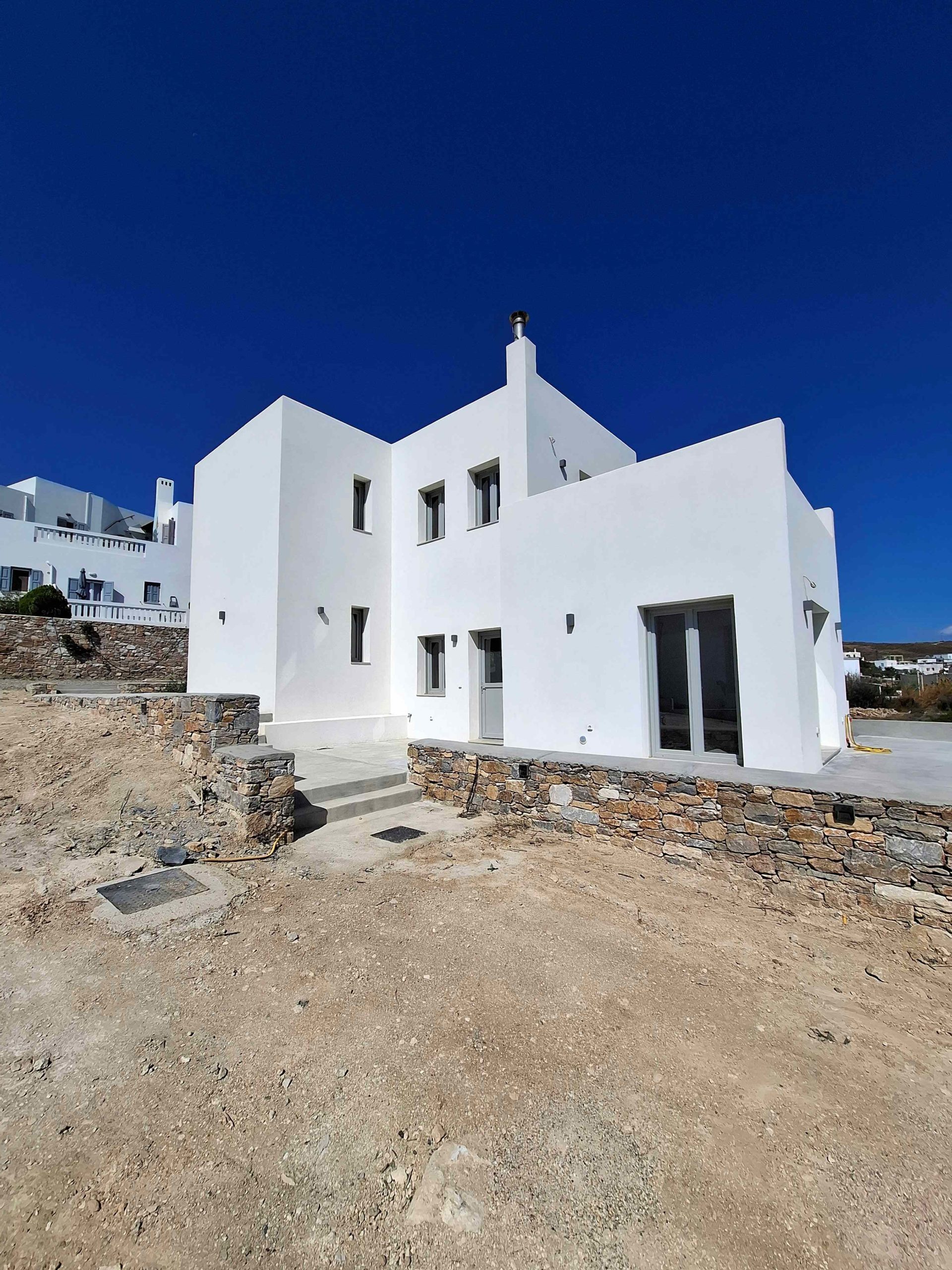 Κατασκευή διώροφης κατοικίας με διαμόρφωση περιβάλλοντα χώρου στην Αζόλιμνο Σύρου gallery